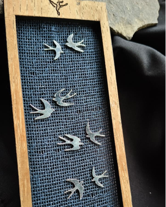 Aretes golondrina