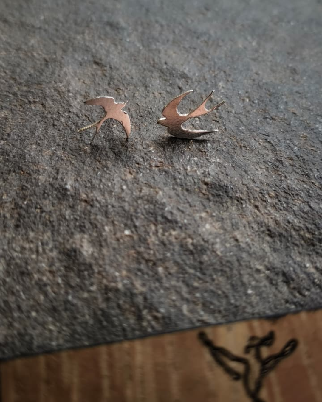Aretes golondrina